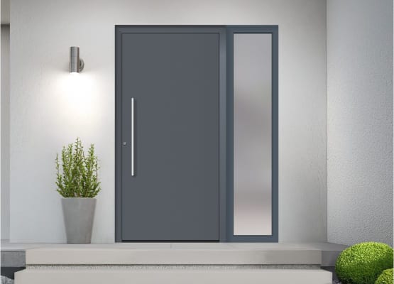 Puerta de entrada de aluminio con fijo lateral